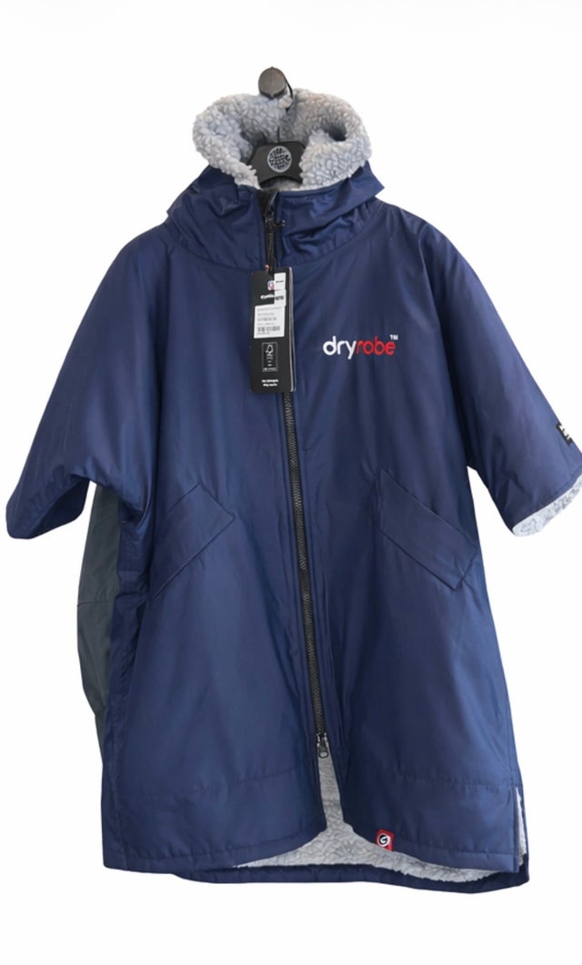 Changing Ponchos | Ocean House Surf
