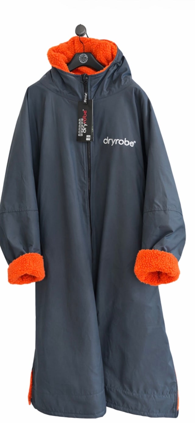 Changing Ponchos | Ocean House Surf